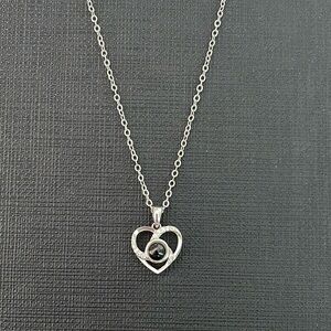 viral I Love You in 100 languages projection necklace